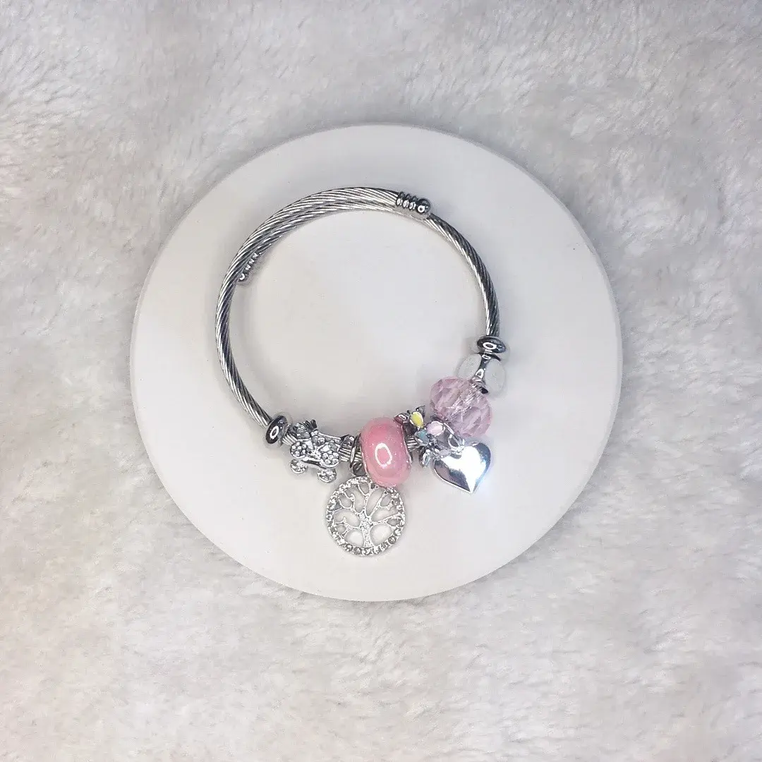 The Timeless Elegance Of A Stainless Steel Charm Bracelet 1