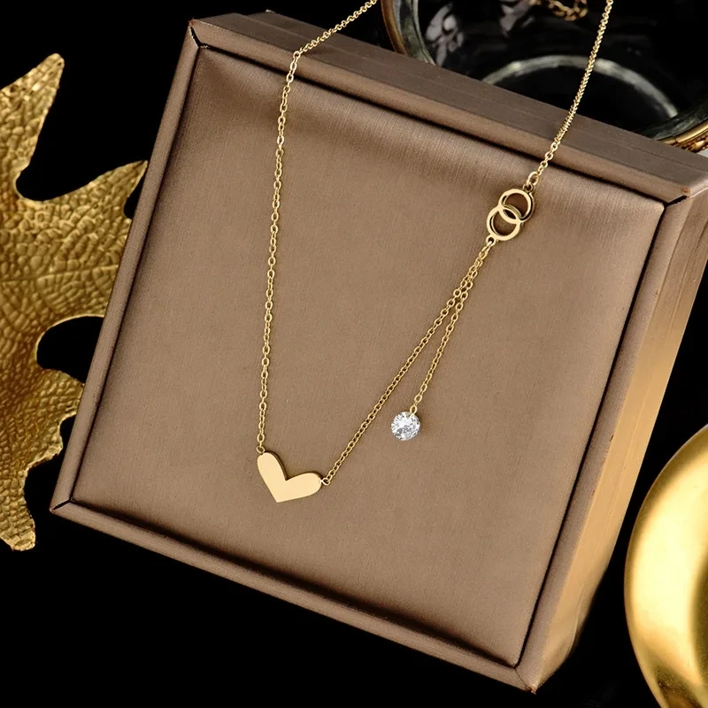 Hot Sell Fashion Stainless Steel Clavicle Chain Simple Love Heart Pendant Tassel Necklace 1