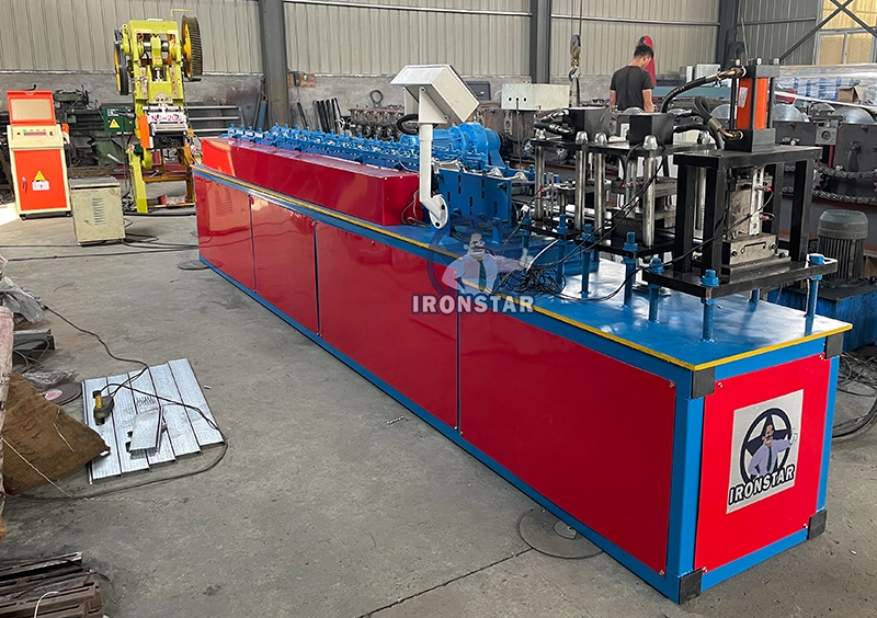 IRONSTAR perforated rolling shutter door roll forming machine in Mexico 1