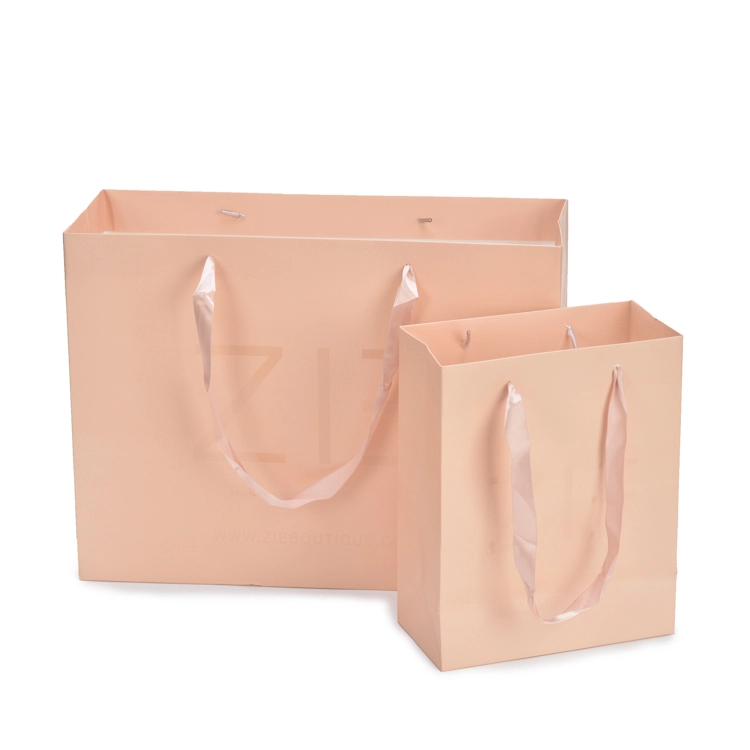 Customized Elegant Pink Kraft Paper Packaging Bag 1