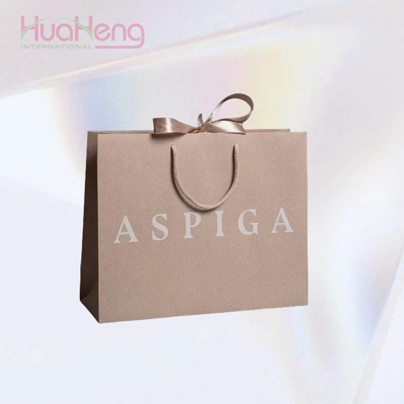 Hua Heng Elegant Pink Branded Apparel Bags - Sophisticated Packaging for Stylish Clothing 1