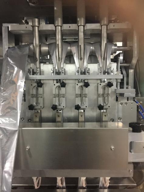 Máquina empacadora multilínea con sellado de polvo en los cuatro lados & 9