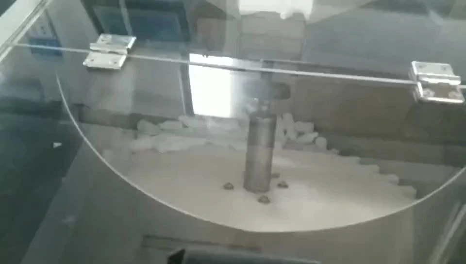 Vials filling and stoppering machine 1