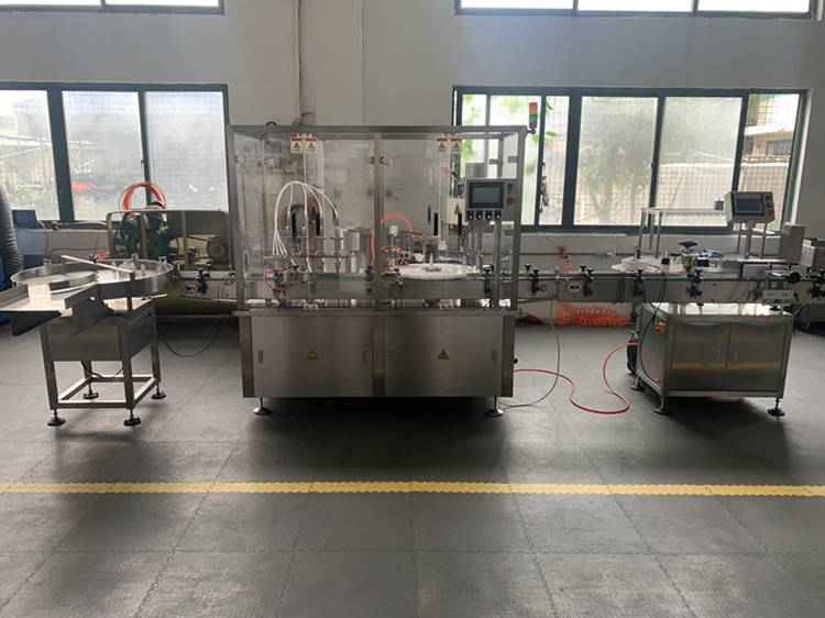 Automatic Spray filling and capping machine 2