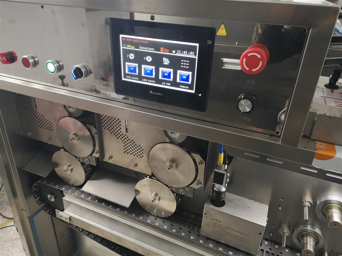 Capsule printing machine 5