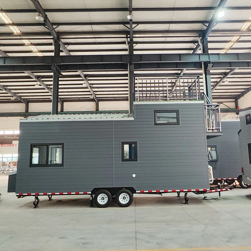 Casa pequeña con remolque camper 1