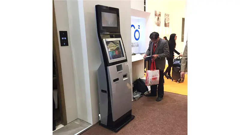 Self-service check in kiosk with bar code reader in hotel 4