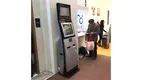 Self-service check in kiosk with bar code reader in hotel 4