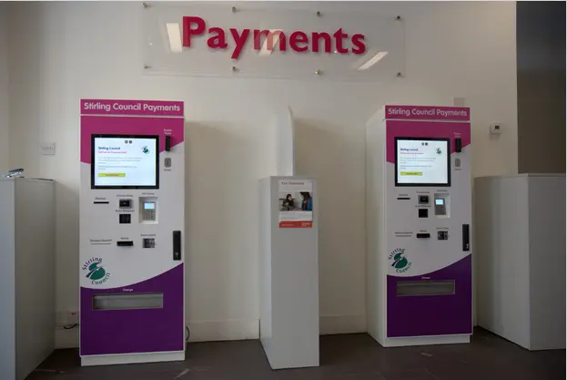 wall mounted payment kiosk keyboard in bank 4