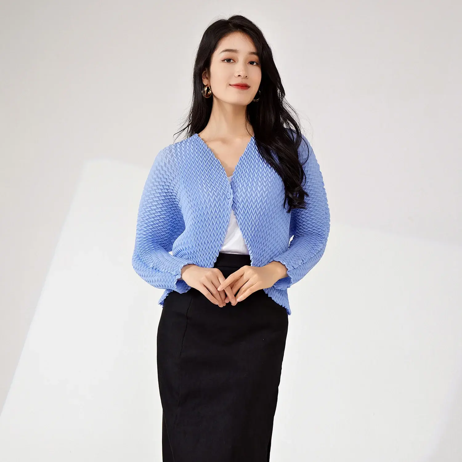 Stay Cozy In Style With A Chic Pleated Cardigan Sweater 1