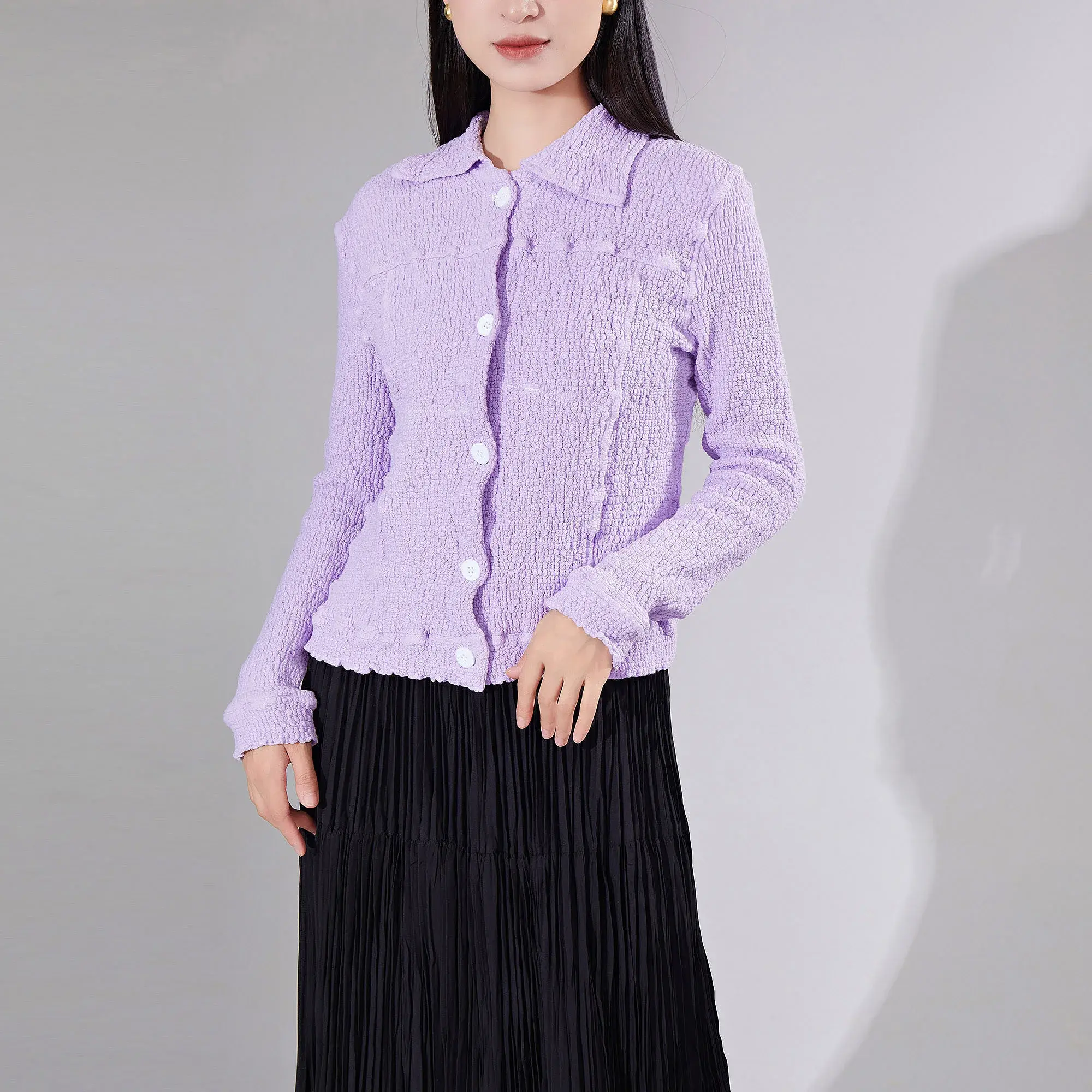 Stylish And Feminine: The Women's Pleated Blouse Trend 1