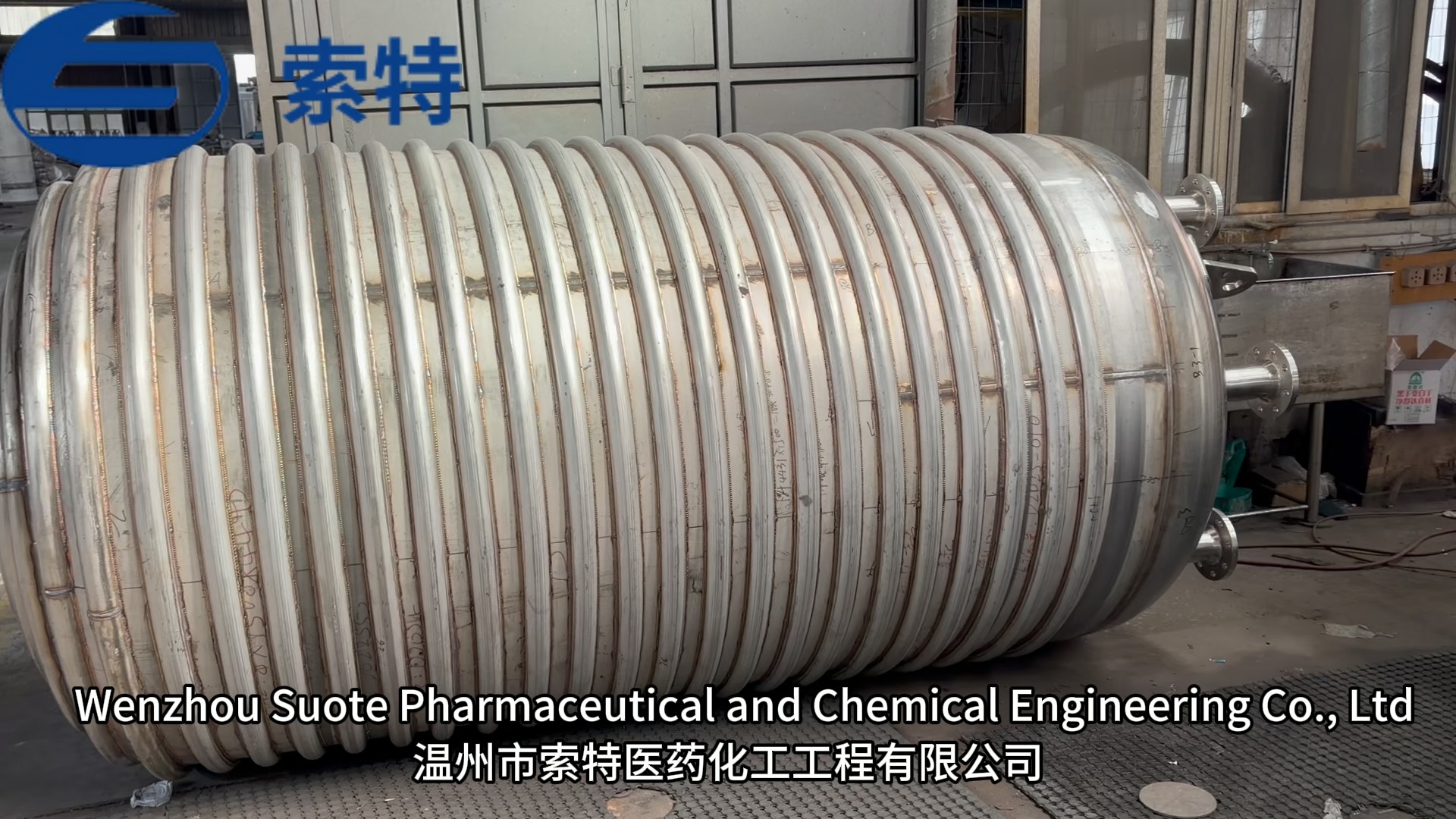 Aqueous solution storage tank with coil