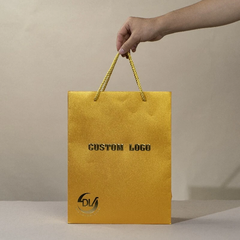 Custom ribbon handle cardboard packaging bag matte retail luxury boutique clothing gift paper shopping bag with logo 1