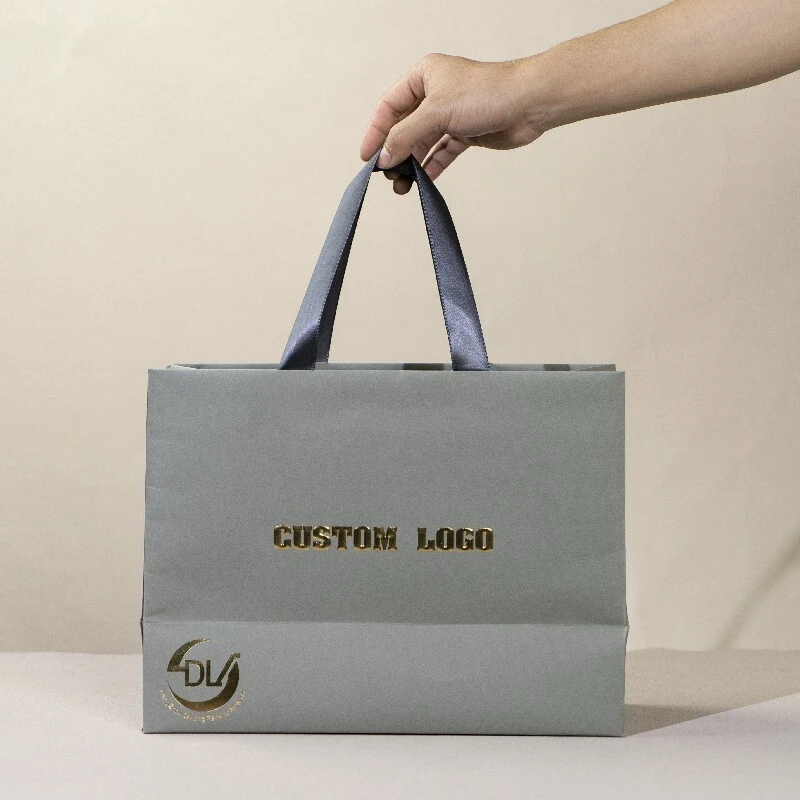 Wholesale luxury black shoes clothes packaging paper bags printed custom logo clothing shopping gift jewelry wine paper bag 1