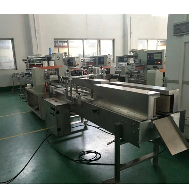 स्वचालित बांस टॉयलेट पेपर रिवाइंडिंग काटने और पैकिंग मशीन 1