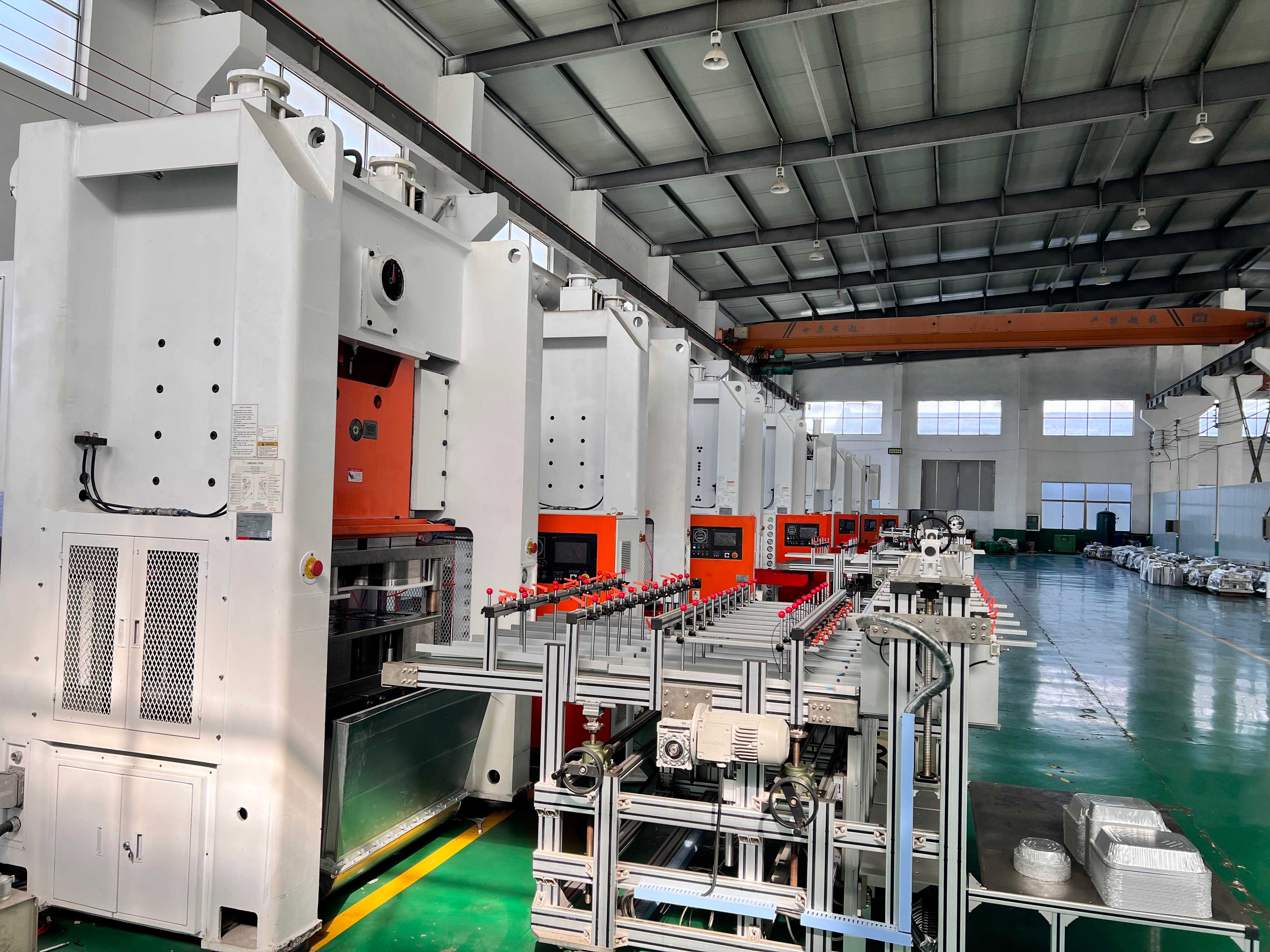 Máquina LK-T80 para fabricar envases de aluminio de alta producción: 9000-12000 unidades/hora, funcionamiento 24/7. 5