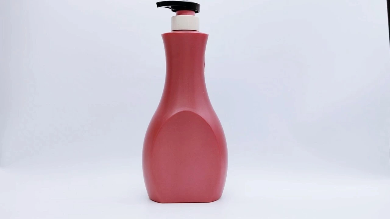 Botella glamurosa de champú y acondicionador de PE/PET rojo de 700 ml para el cuidado de la piel. 1