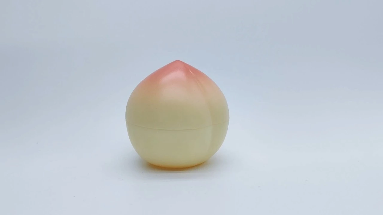 Glamuroso tarro de crema de doble pared de PET con forma de fruta de melocotón de 30 g 1