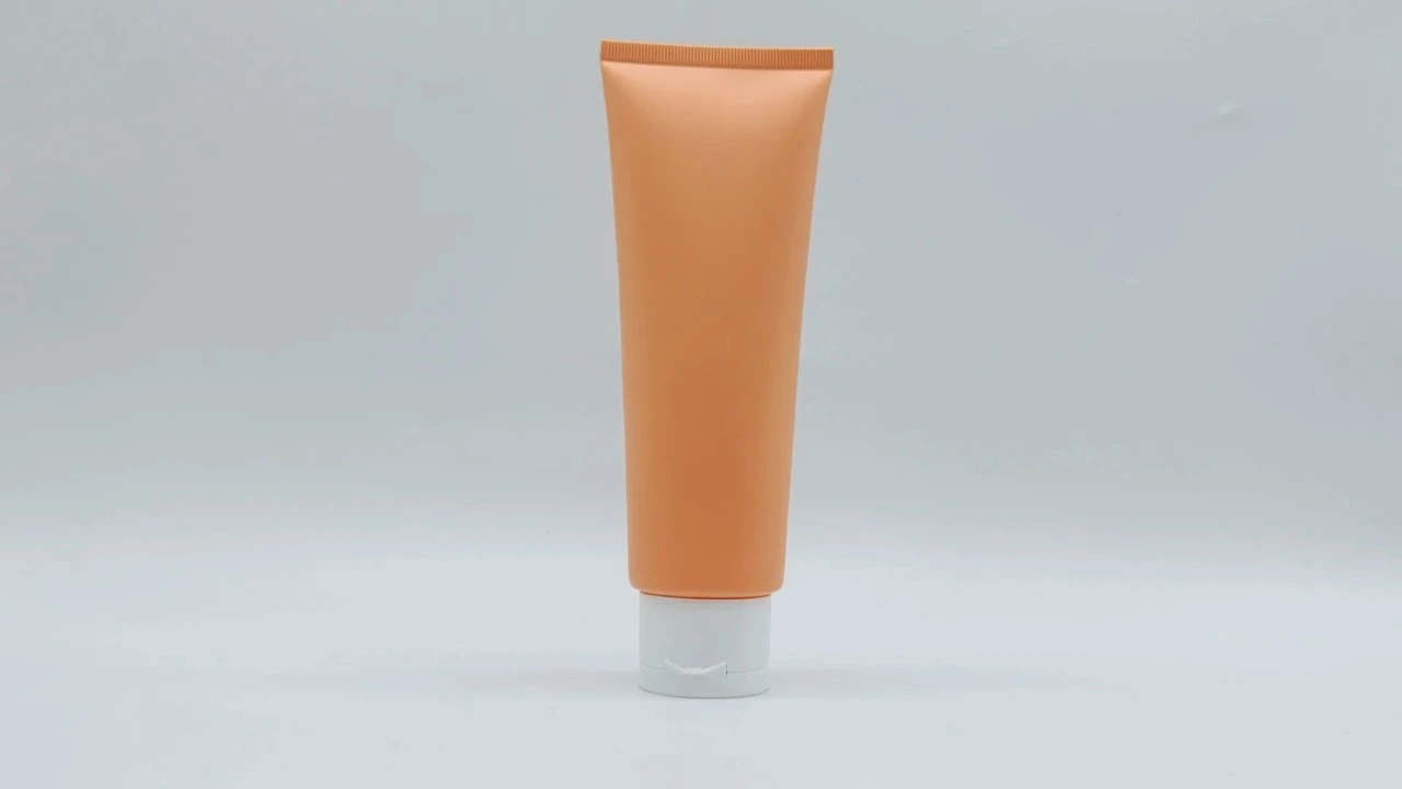 OEM Customized cosmetic plastic extrusion packaging tube for face and hand cream with flip cover 1
