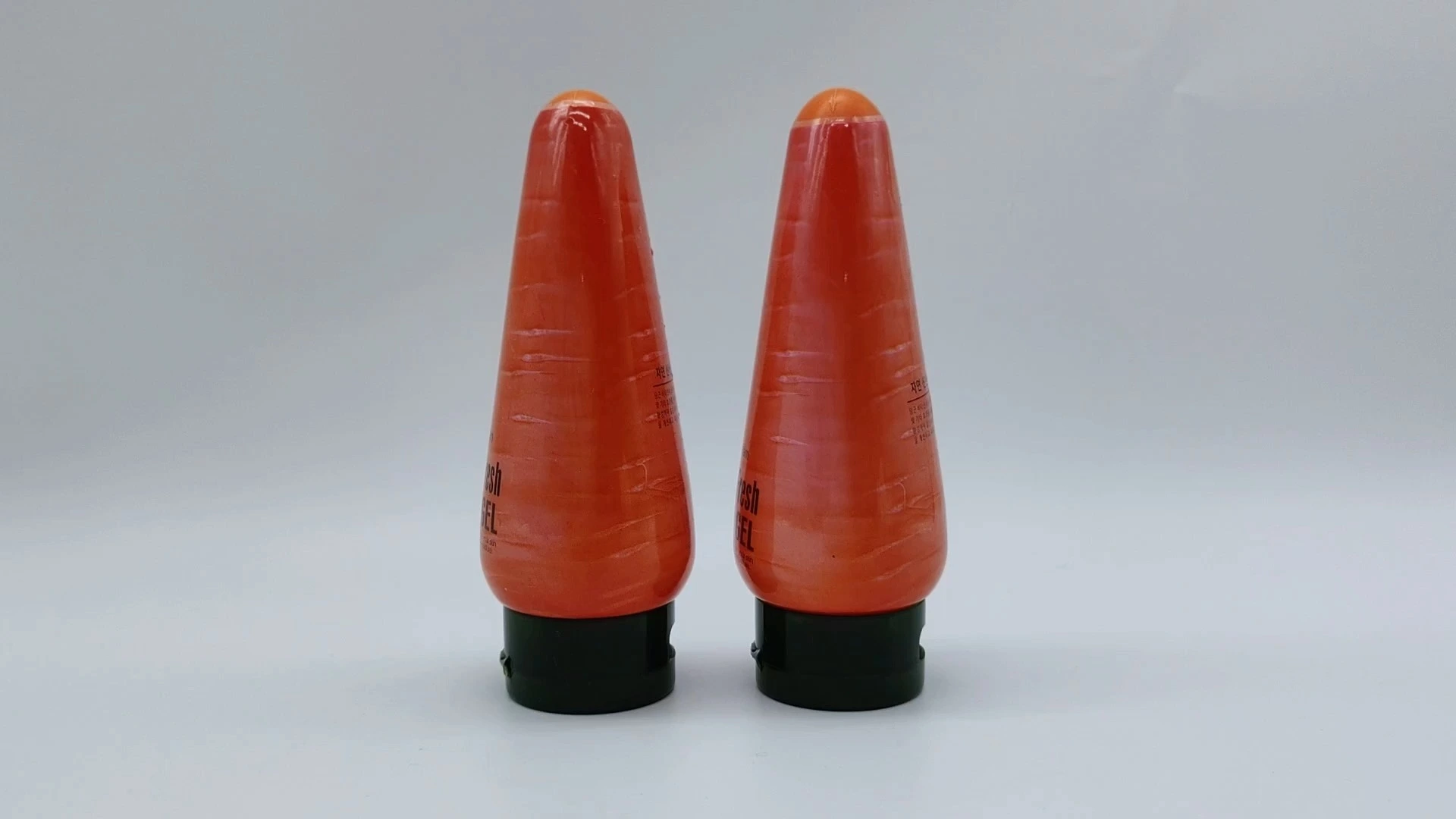 Envase de plástico con forma de zanahoria, diseño naranja, de 90 ml, para loción, champú, esencia, crema, envases de PE, plástico, PS y PET. 1