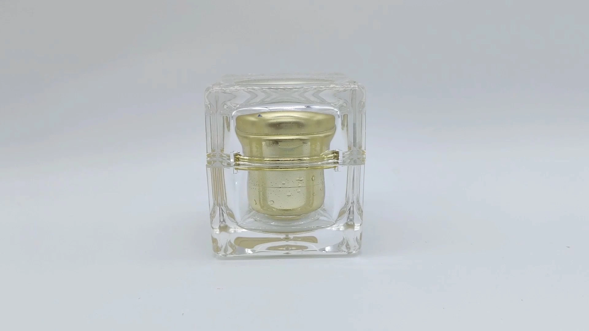 Frascos de crema de 45 ml con superficie transparente de cristal cúbico de alta calidad e interior dorado. 1