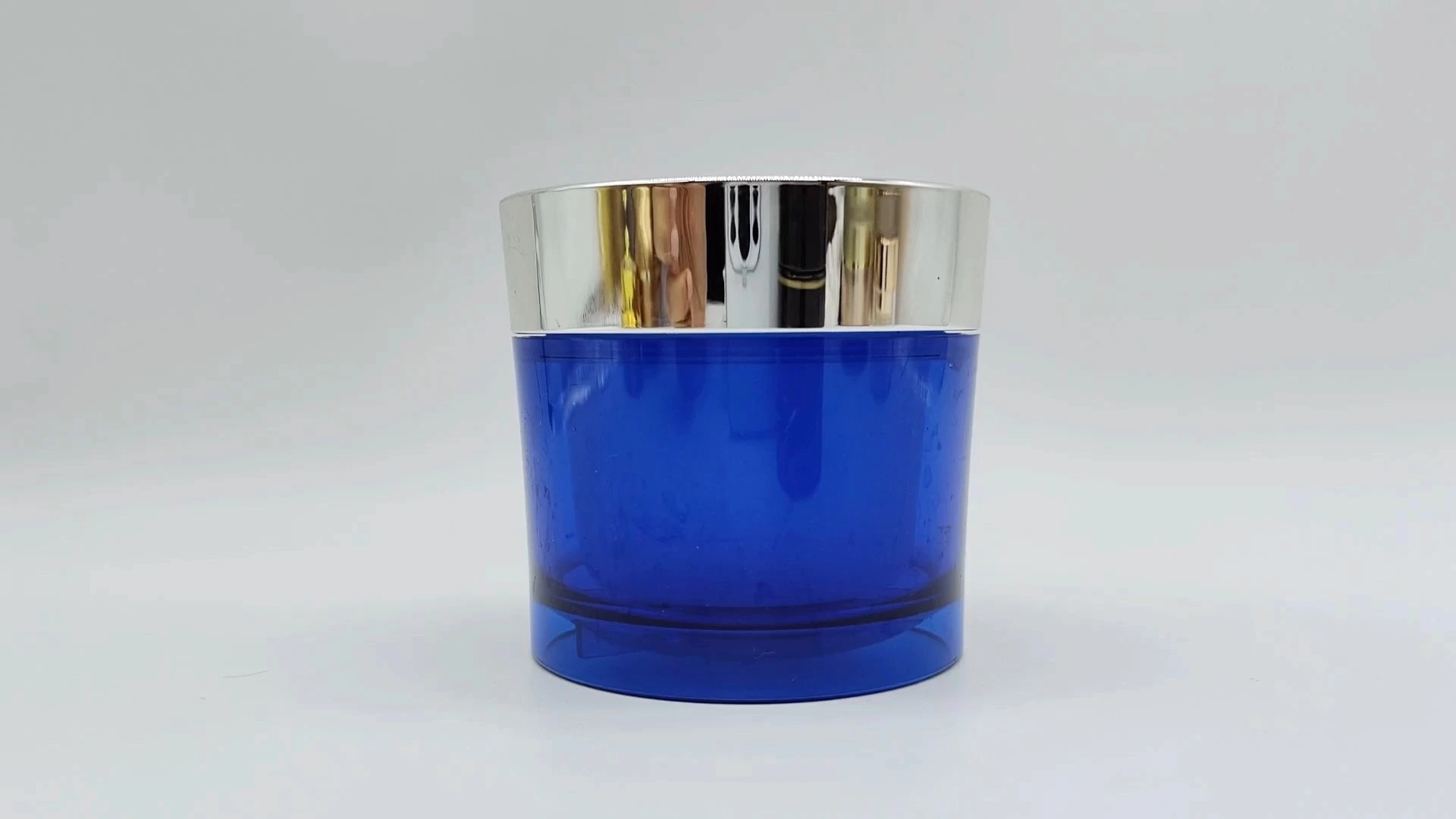 Envase de plástico PE-AS de 100 ml para crema facial y cuidado de la piel, con forma redonda, azul plateado, galvanizado, con tapón de rosca. 1