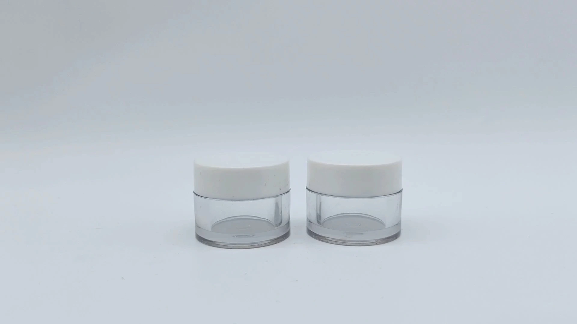 Envase de crema para el cuidado de la piel facial, de plástico PE, transparente y blanco, personalizado, de tamaño pequeño, de 5 ml, con tapa, ideal para cosméticos. 1