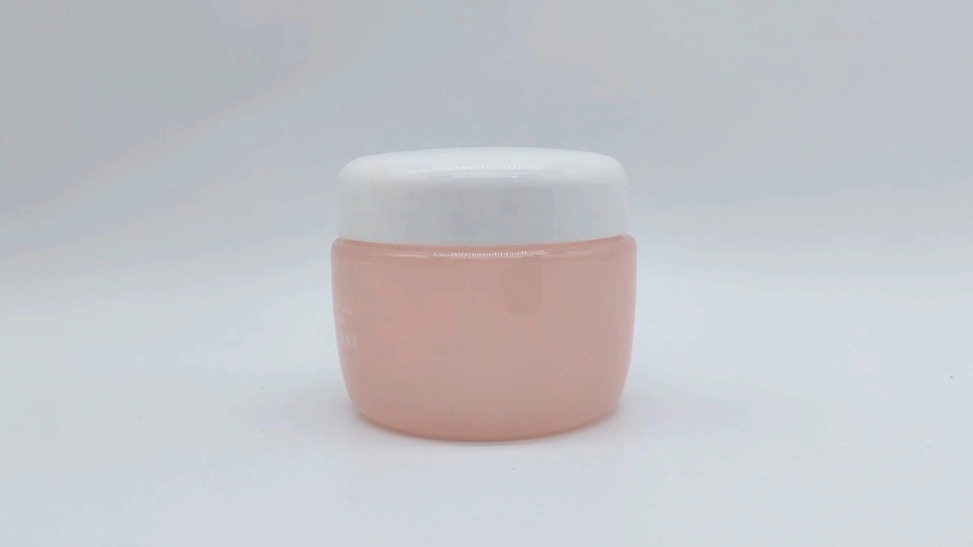 Envase de crema facial y de manos personalizado, color rosa y blanco, de 80 ml, ideal para el cuidado de la piel. 1