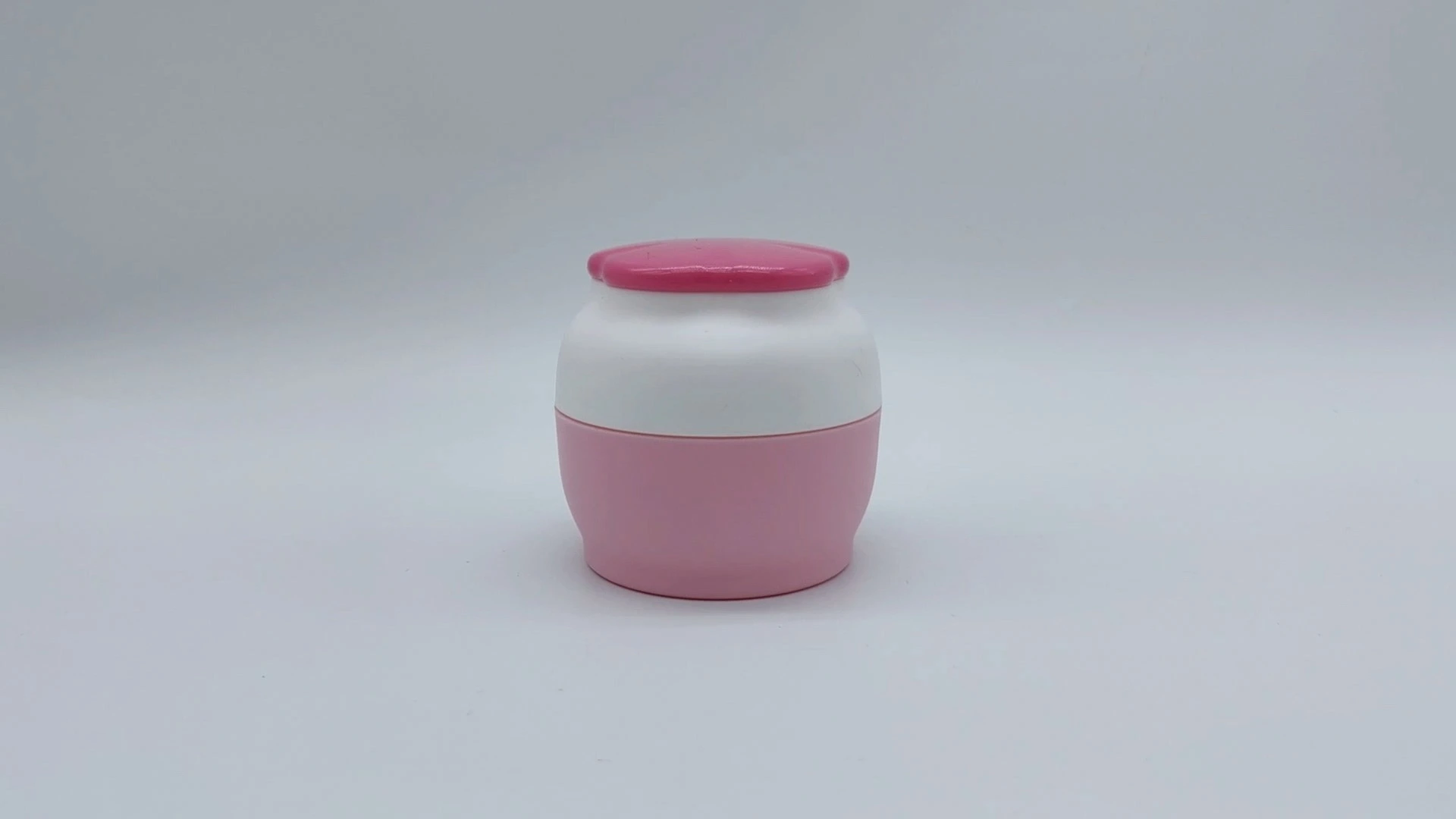OEM Custom Beliebte weiße und rosa Blumenmuster Capping 40ml Kunststoff-PE Gesichts-Hand-Hautpflege-Creme Container Kosmetikverpackung Gläser 1