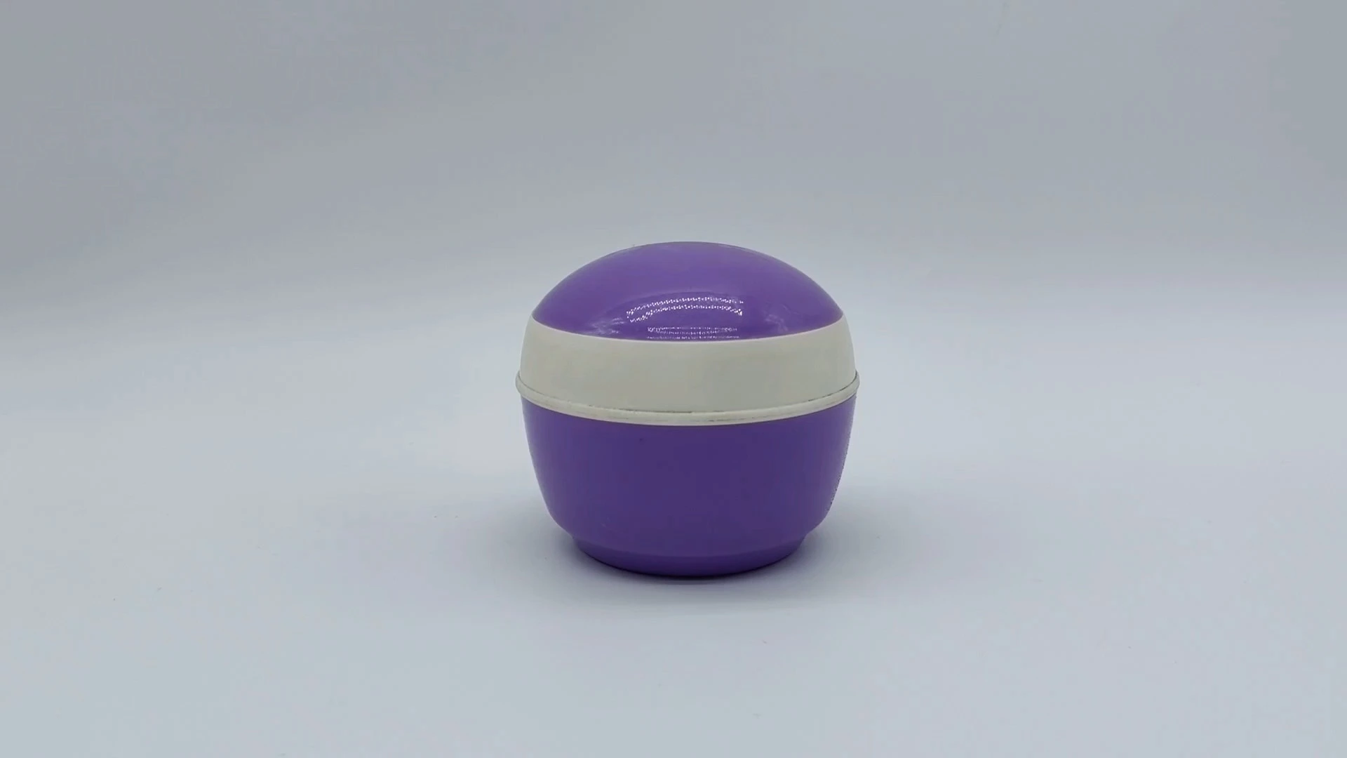 Envase de plástico PE para crema facial y cuidado de la piel, personalizado, de 50 ml, con forma de bola morada y blanca, para cosméticos. 1