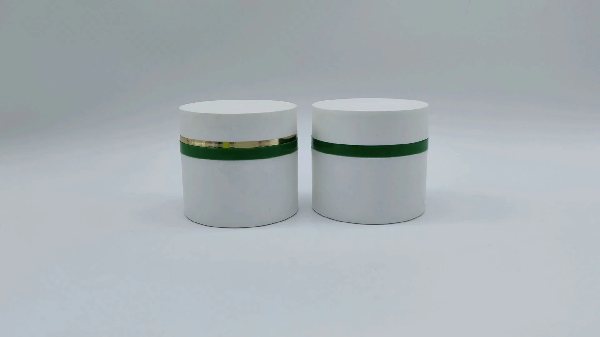 Envase de plástico PE-AS de 45 ml para crema facial y cuidado de la piel, personalizado, de gran venta, con temática blanca y anillo decorativo, para envases cosméticos. 1