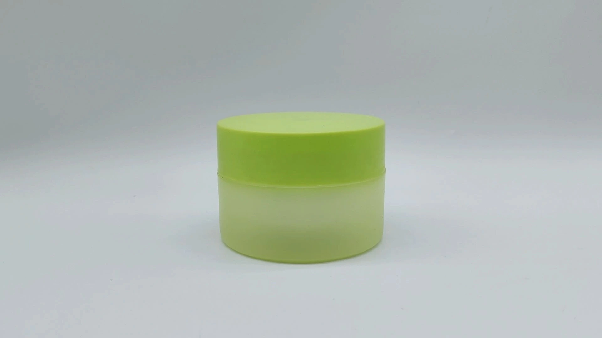 Frasco transparente personalizado de lujo con tapa verde de doble pared de 90 ml de plástico PE para cremas faciales y de manos, envases cosméticos. 1