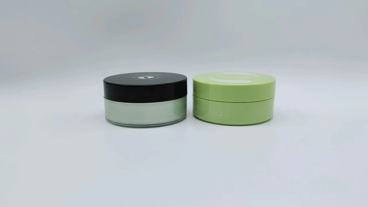 Frasco plano redondo transparente personalizado, interior blanco, tapa negra/verde, doble pared, 100 ml, plástico PE, para cremas faciales, cuidado de la piel, envases cosméticos. 1