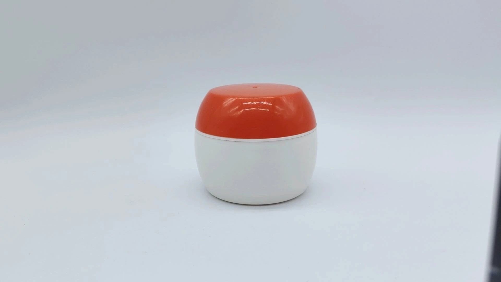 Frasco redondo de doble pared blanco personalizado de alta calidad con tapa naranja, de plástico PE de 50 ml, para cremas faciales y de manos, envases cosméticos. 1