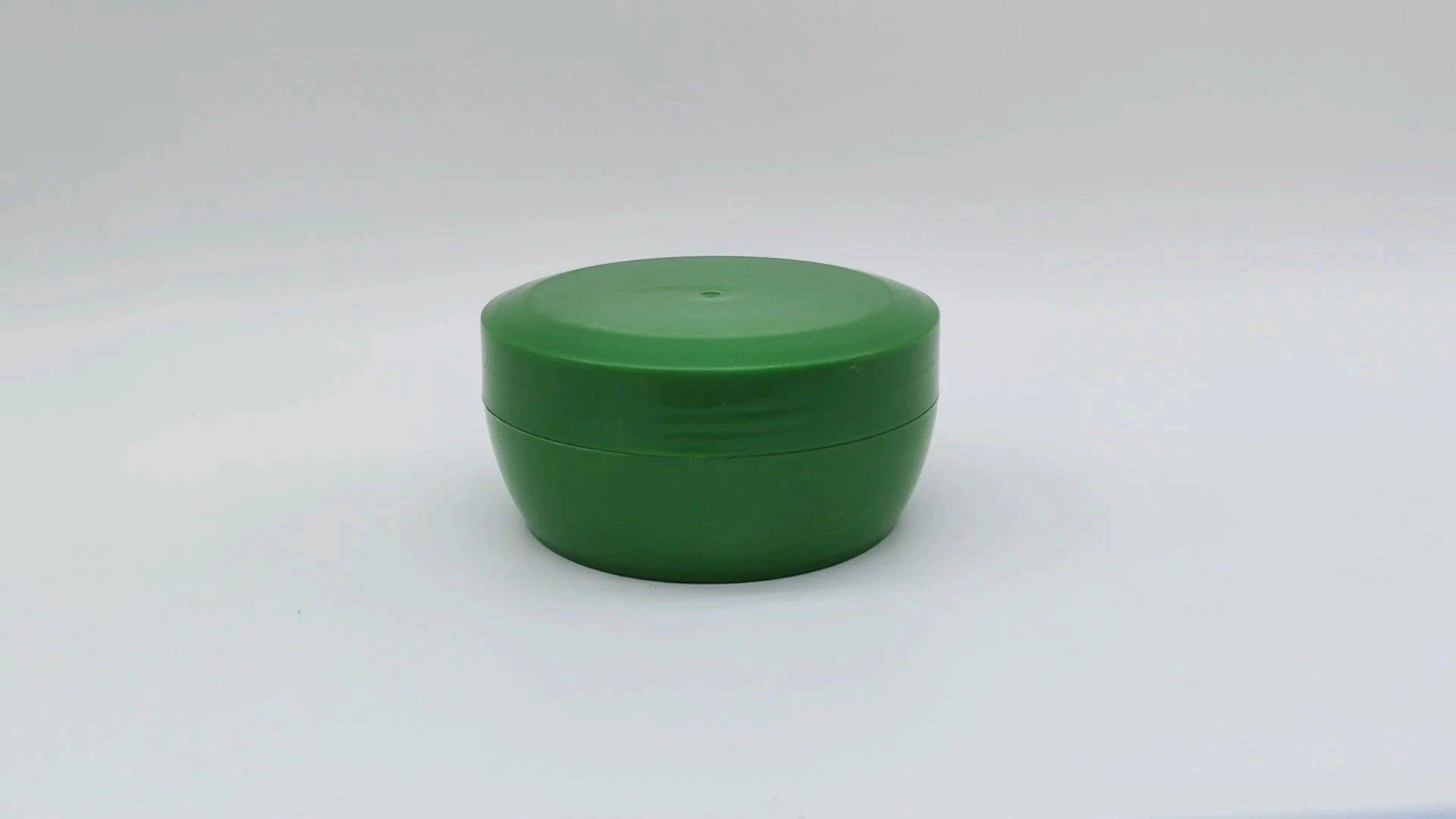 Envase de plástico PE verde personalizado de 90 ml para crema facial y cuidado de la piel de las manos, simple y práctico. 1