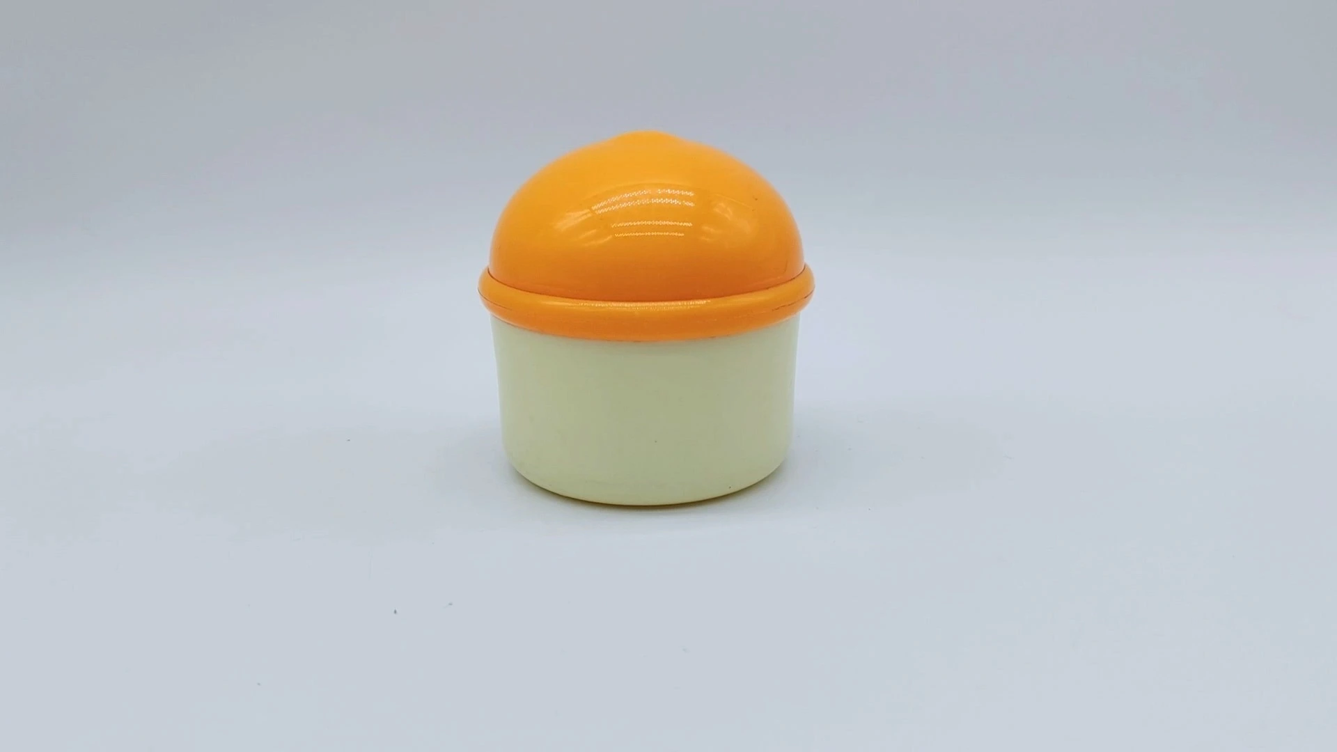 Envase beige personalizable de gran venta con tapa de rosca naranja, de plástico PE de 50 ml, para crema facial, cuidado de la piel, gel capilar, envases cosméticos. 1