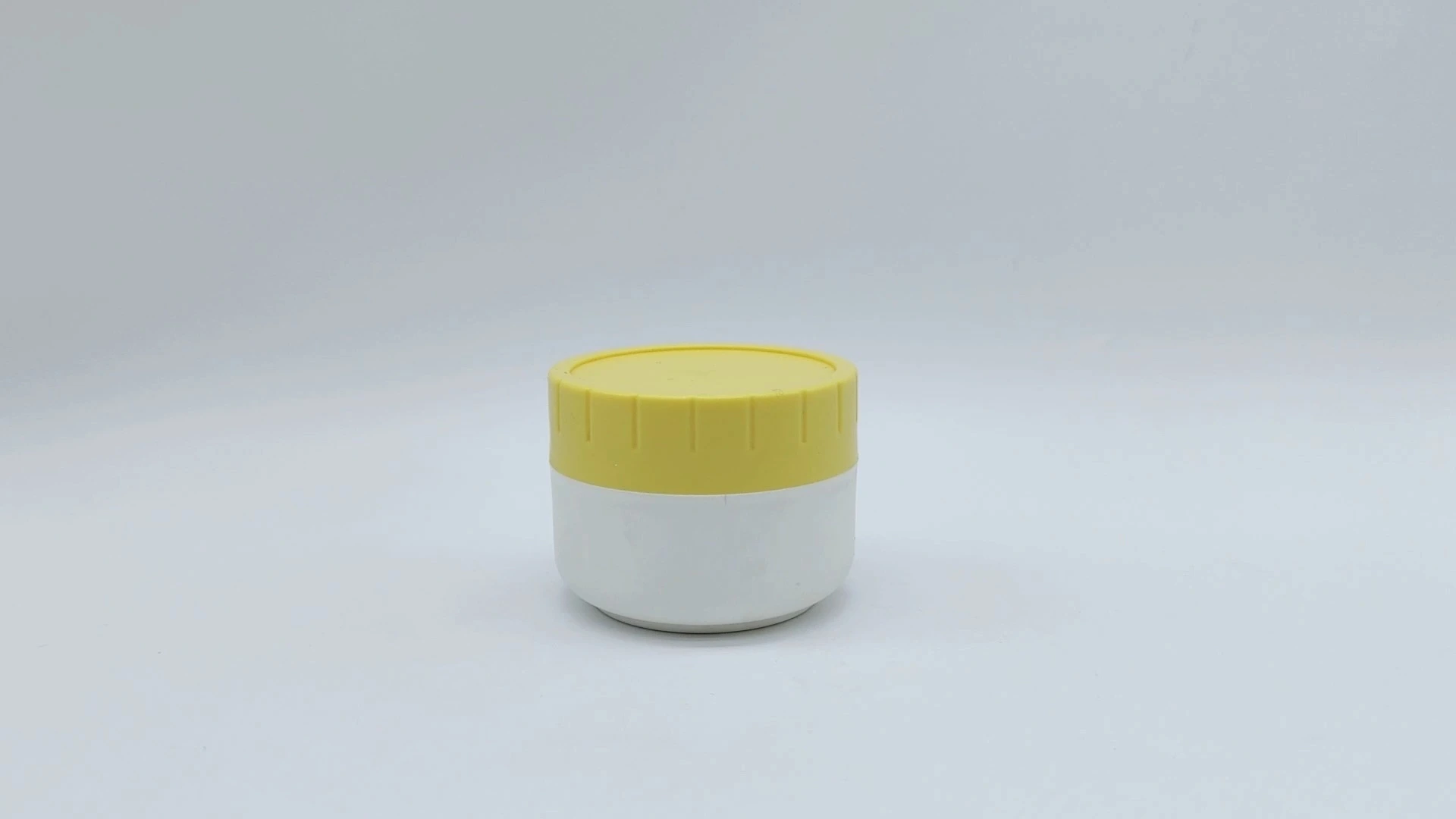 Frasco cilíndrico clásico personalizable de plástico PE de 35 ml, color blanco y limón, ideal para cremas faciales y de manos, ideal para el cuidado de la piel y cosméticos. 1