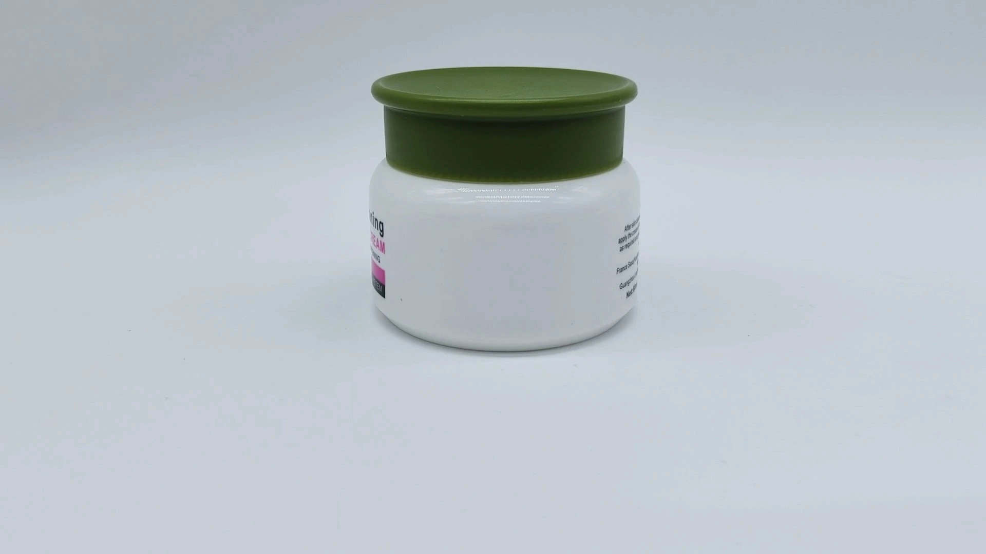 Frasco redondo blanco personalizable clásico de gran venta y tapa verde, de plástico PE de 80 ml, ideal para cremas faciales y cuidado de la piel, envases cosméticos. 1
