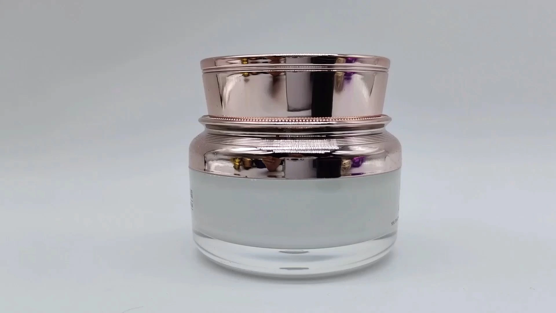 Envase de crema para el cuidado de la piel facial y de las manos de plástico PE-AS de 50 ml, personalizado, redondo, transparente y dorado, con acabado galvanizado, para envases cosméticos. 1
