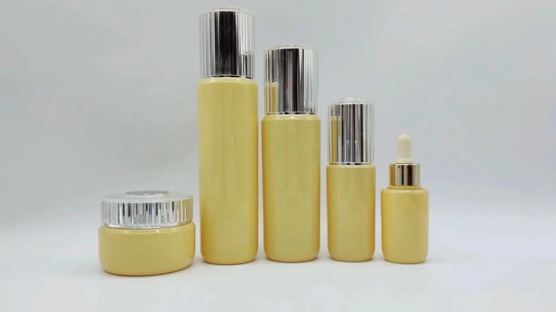 High Class Custom Double Wall Yellow and Silvery Electroplated Lid Ribbed Finishing 50ml Plastic PE AS Facial Cream Hand Cream Skin Care Cream Container  Cosmetic Packaging Jars 1