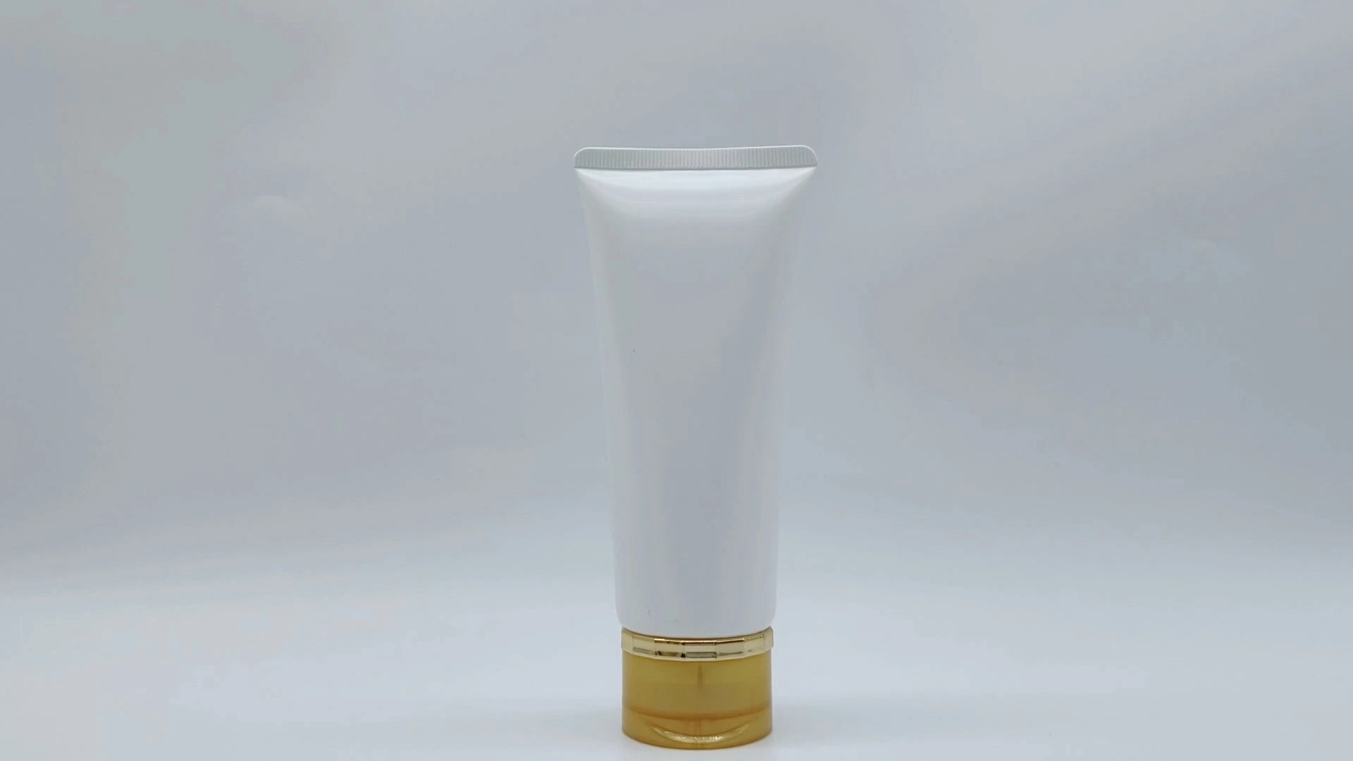 Tubo de lavado facial ecológico glamuroso de 100 g, 120 g, 150 g y 200 g, tubo suave de polietileno con capacidad personalizada y cubierta dorada. 1