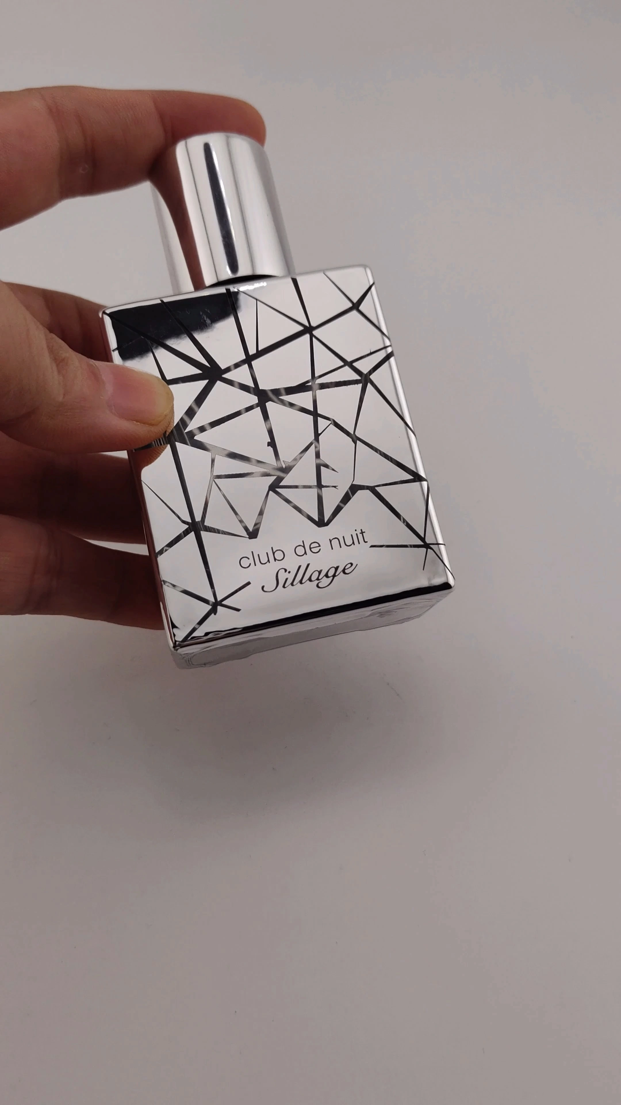 Botella de perfume plateada de alta calidad, venta al por mayor, glamurosa, de 30 ml, 50 ml y 100 ml, rectangular, vacía, transparente, con atomizador. 1