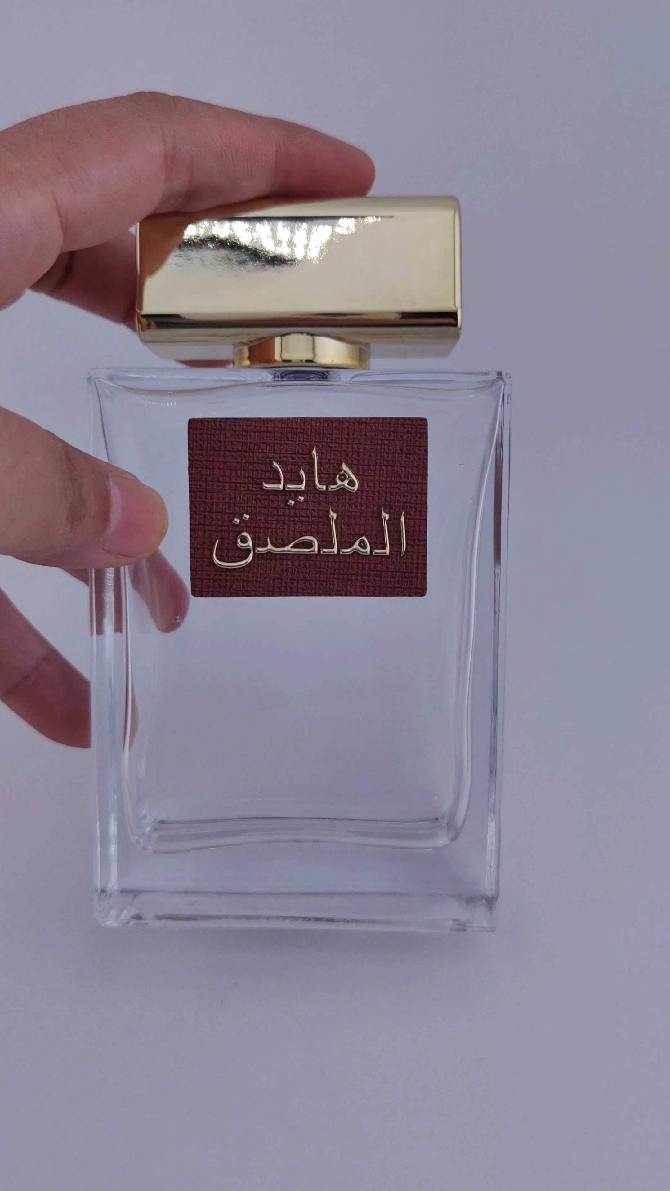 Botella de perfume de nuevo diseño glamoroso Botella de perfume exquisita Diseño único Botella de perfume transparente vacía Botella de perfume de 30 ml 50 ml 100 ml 1