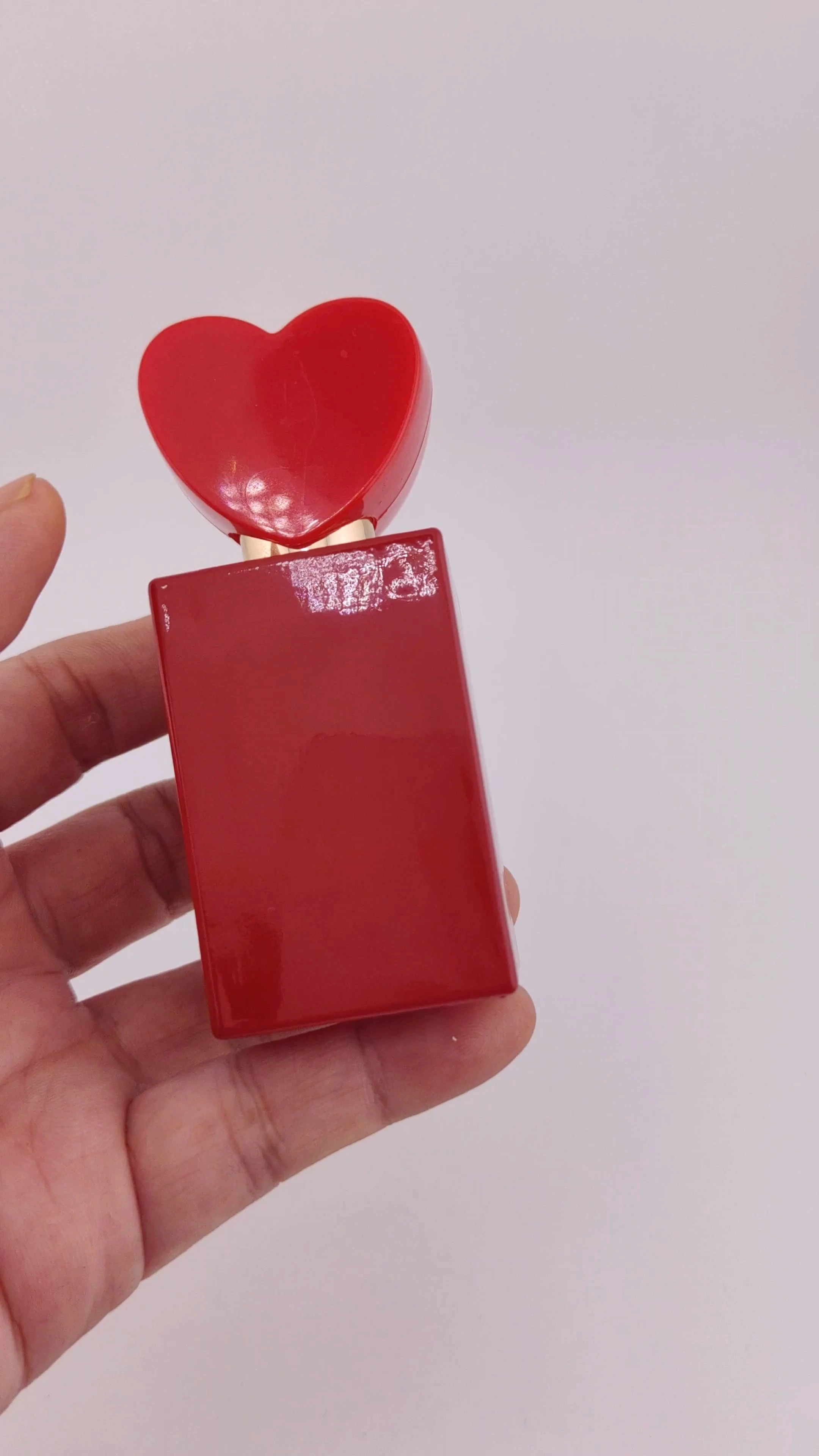 Botella de perfume de nuevo diseño glamurosa, botella de perfume de diseño único, botella de perfume con forma de amor, botella de perfume con forma de corazón, botella de perfume vacía de color rojo. 1