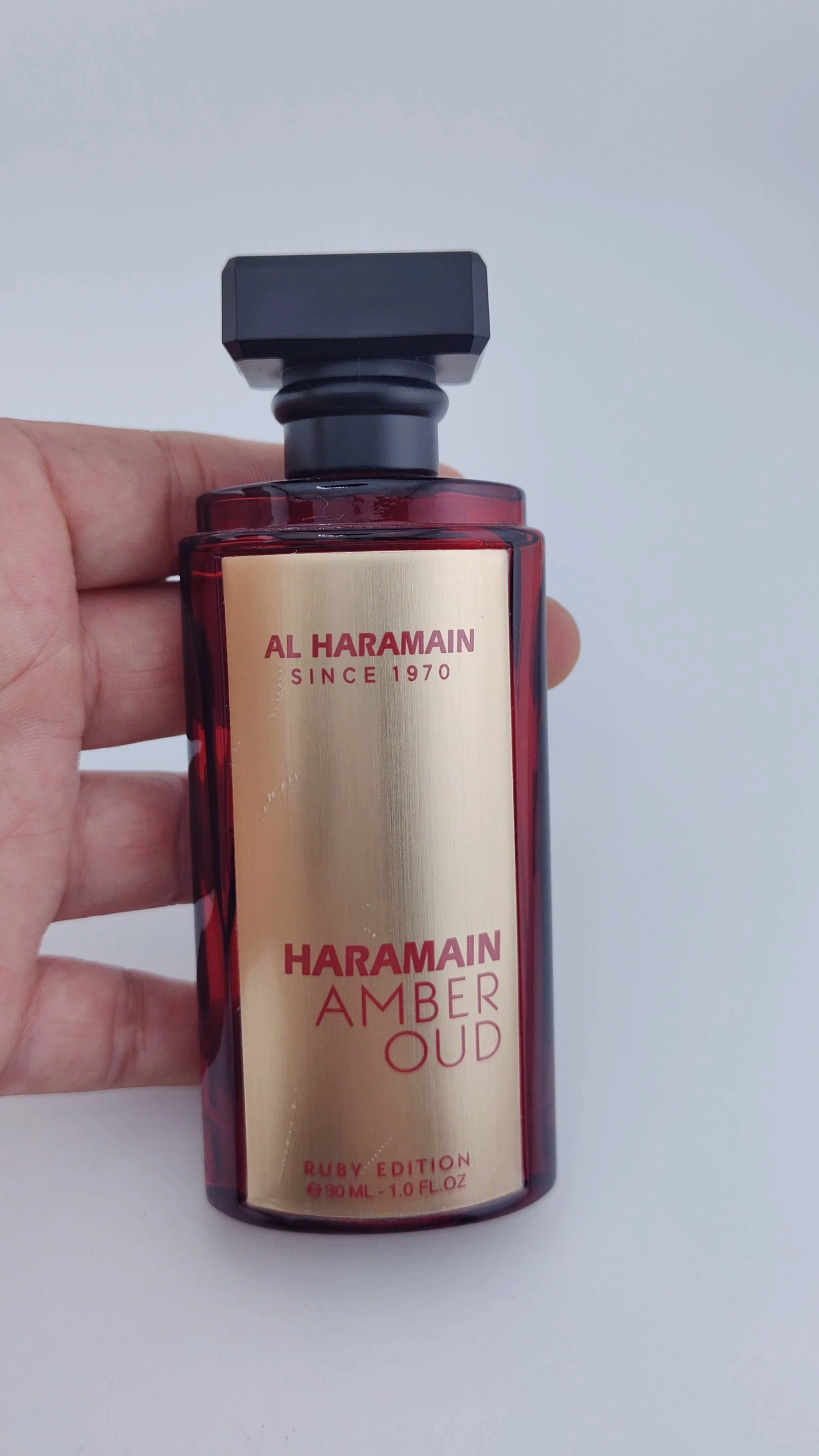 Venta al por mayor, alta gama, exquisito nuevo diseño, botella de perfume vacía transparente, botella de perfume de vidrio de 30 ml, 50 ml, 100 ml, botella de perfume de color rojo, botella de perfume de lujo. 1