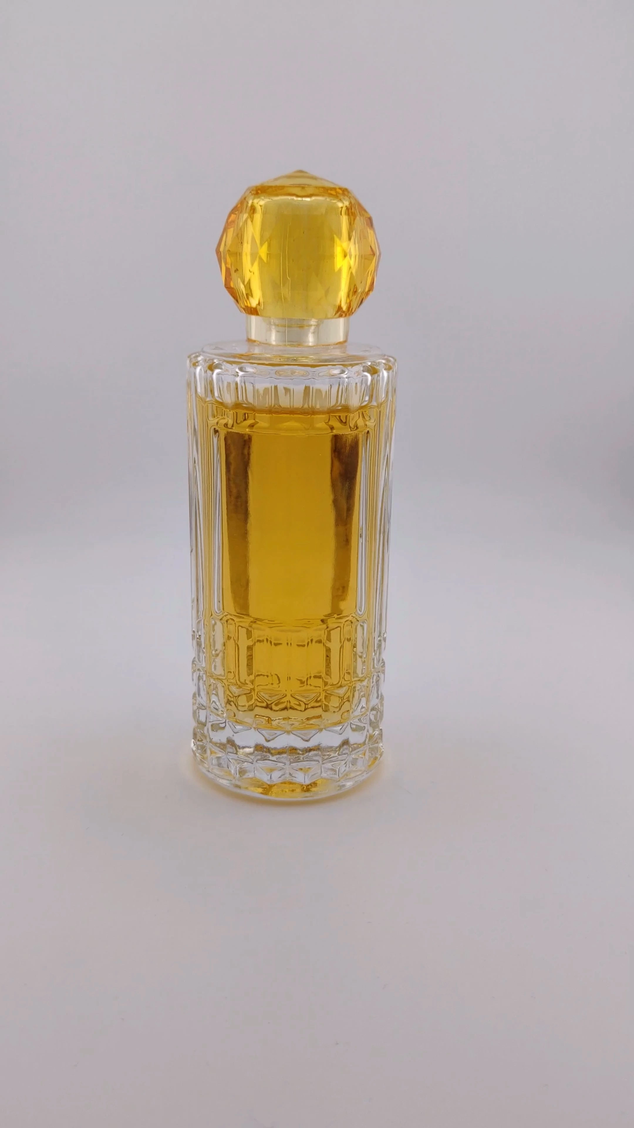 Botella de perfume a precio mayorista, botella de perfume de alta calidad, nuevo diseño, botella de perfume transparente vacía, botella de perfume de vidrio de 30 ml, 50 ml, 100 ml, precio competitivo, botella de perfume de lujo, botella de perfume amarilla 1