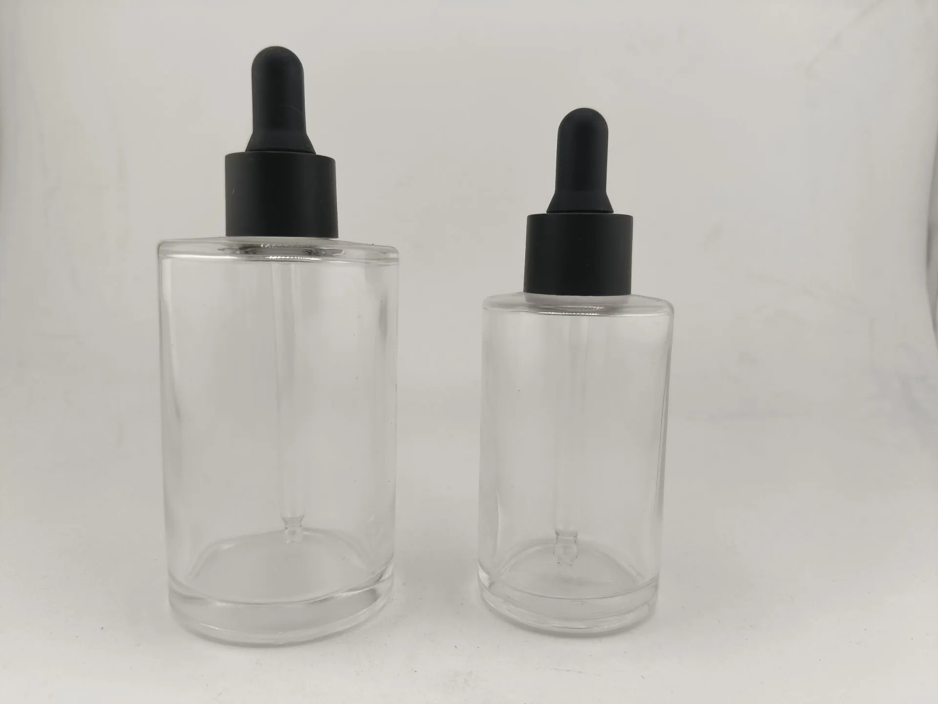 High Clear Glass Serum Bottle with Black Rubber Dropper, 30ml 50ml Cosmetic Packaging Manufacturer 1