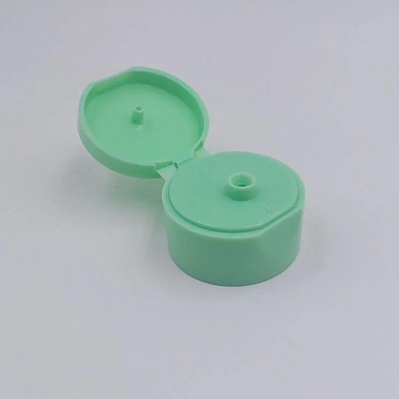 24/410 Mint Green Plastic Flip Top Cap for Cosmetic Squeeze Bottle - Thin Body PP Shampoo Lid 1
