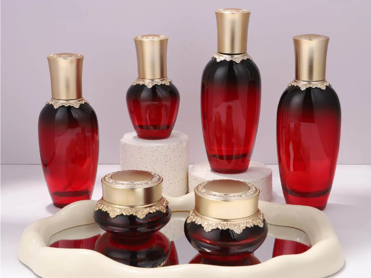 Red Gradient with Ornate Gold Trim Skincare Packaging Set | 150/120/100/40ml Bottles & 50/30g Jars for Luxurious Anti-Aging Lines 1