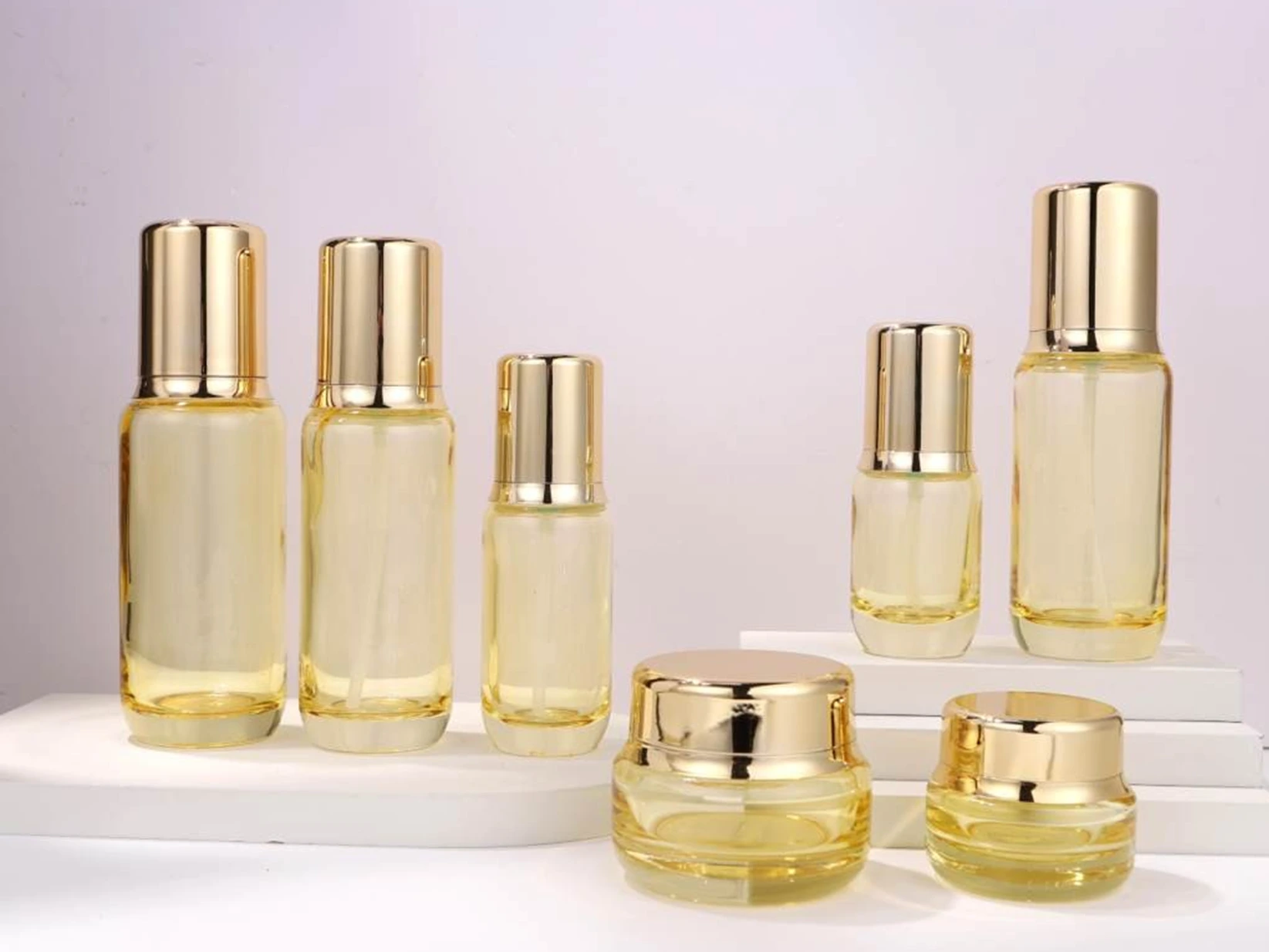 Champagne Gold Transparent with Gold Cap Skincare Packaging Set | 200/150/120/100/50/30ml Bottles & 50/20g Jars for Luxurious Anti-Aging Lines 1